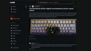 A Reddit post highlights the Sennheiser IE200, praising its balanced sound and comfort, shared alongside a keyboard setup in rheadphones.