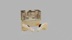 Moondrop Space Travel wireless earbuds infront of the transparent charging case with white stems and silicone tips