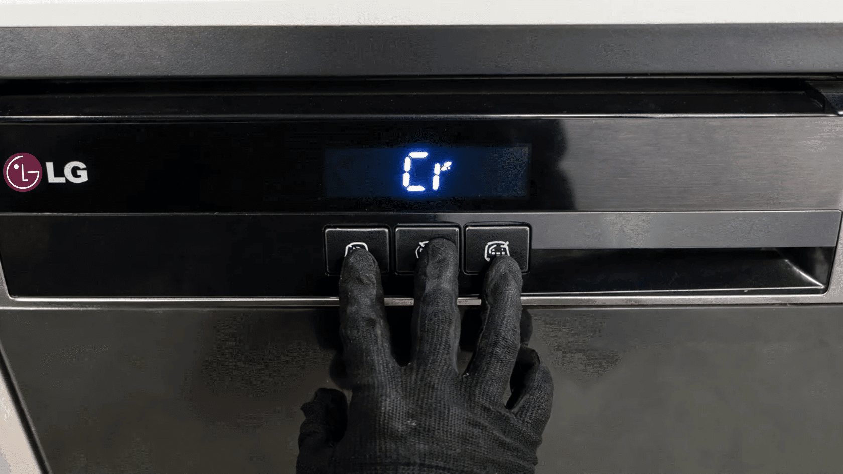 LG dishwasher display showing CL child lock indicator with hand pressing button
