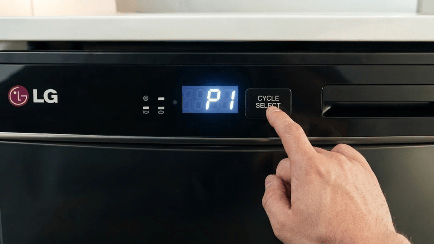 Hand pressing LG dishwasher control button showing P1 cycle setting